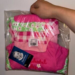3-6 month Gerber 4pack onesie set, Brand new never worn. NWT